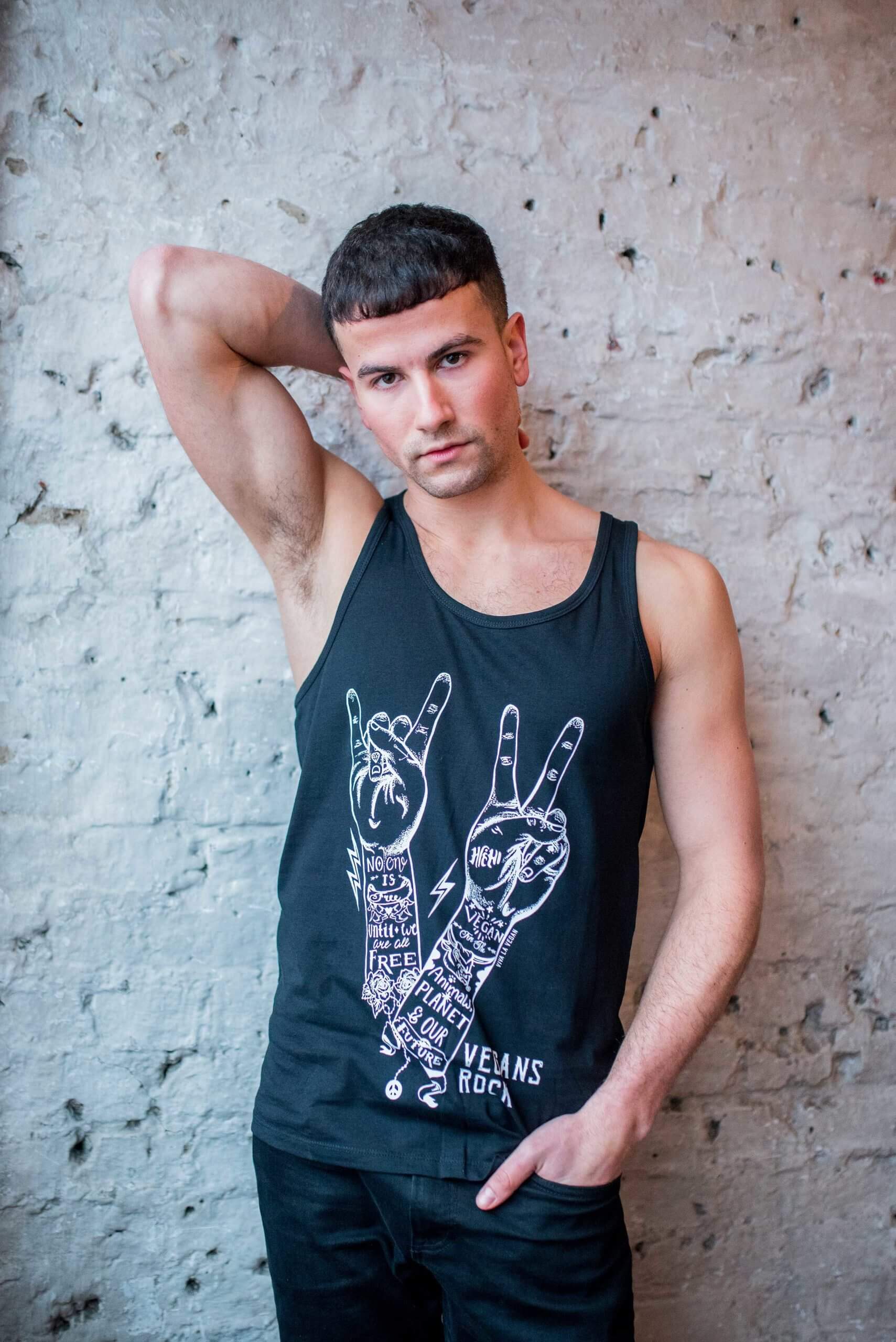 Male Model wearing unisex style Vegans Rock statement organic cotton vest