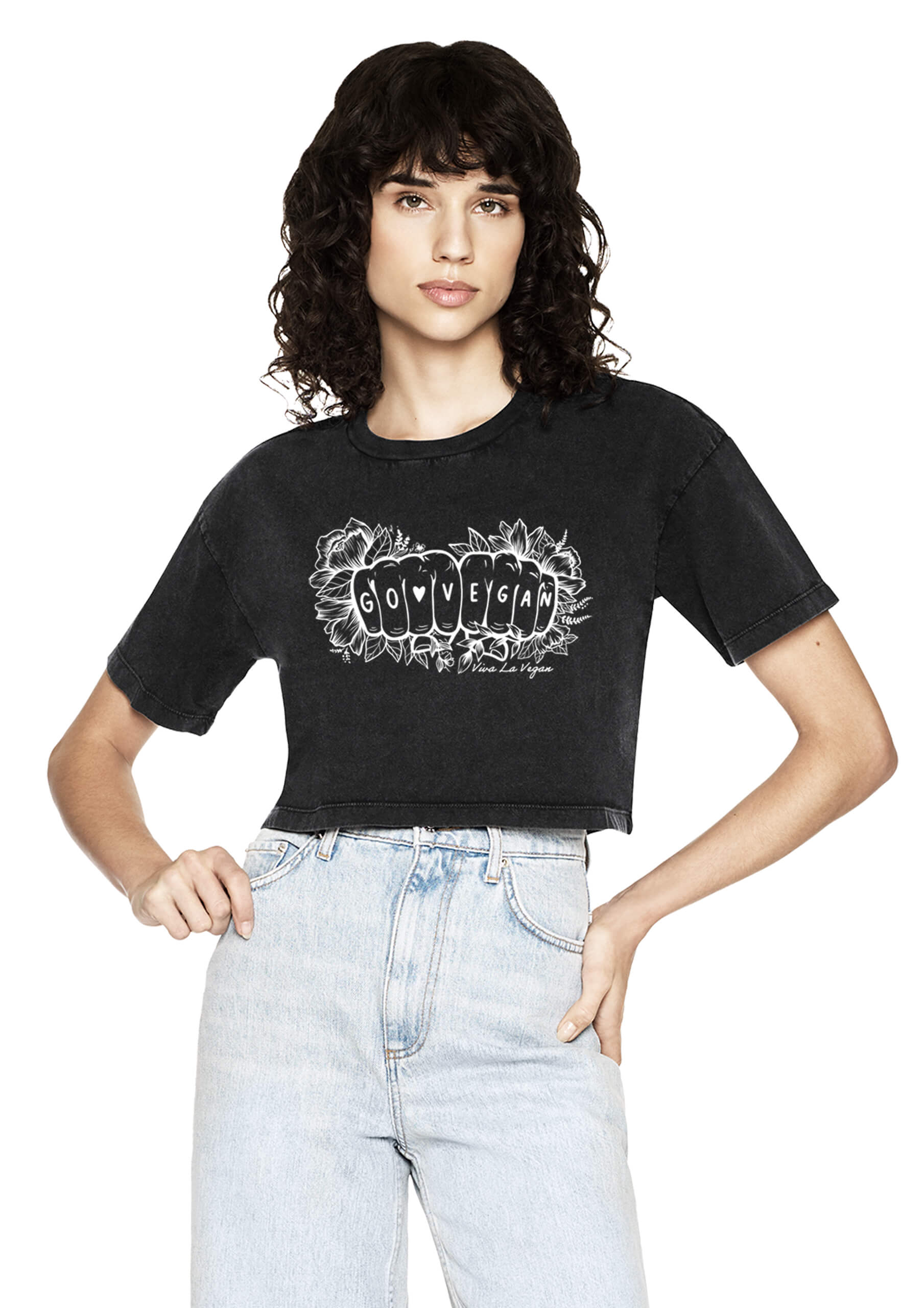 Model wearing eco ethical clothing brand Viva La Vegan's black cropped T-shirt with a vegan tattoo style graphic on the front.