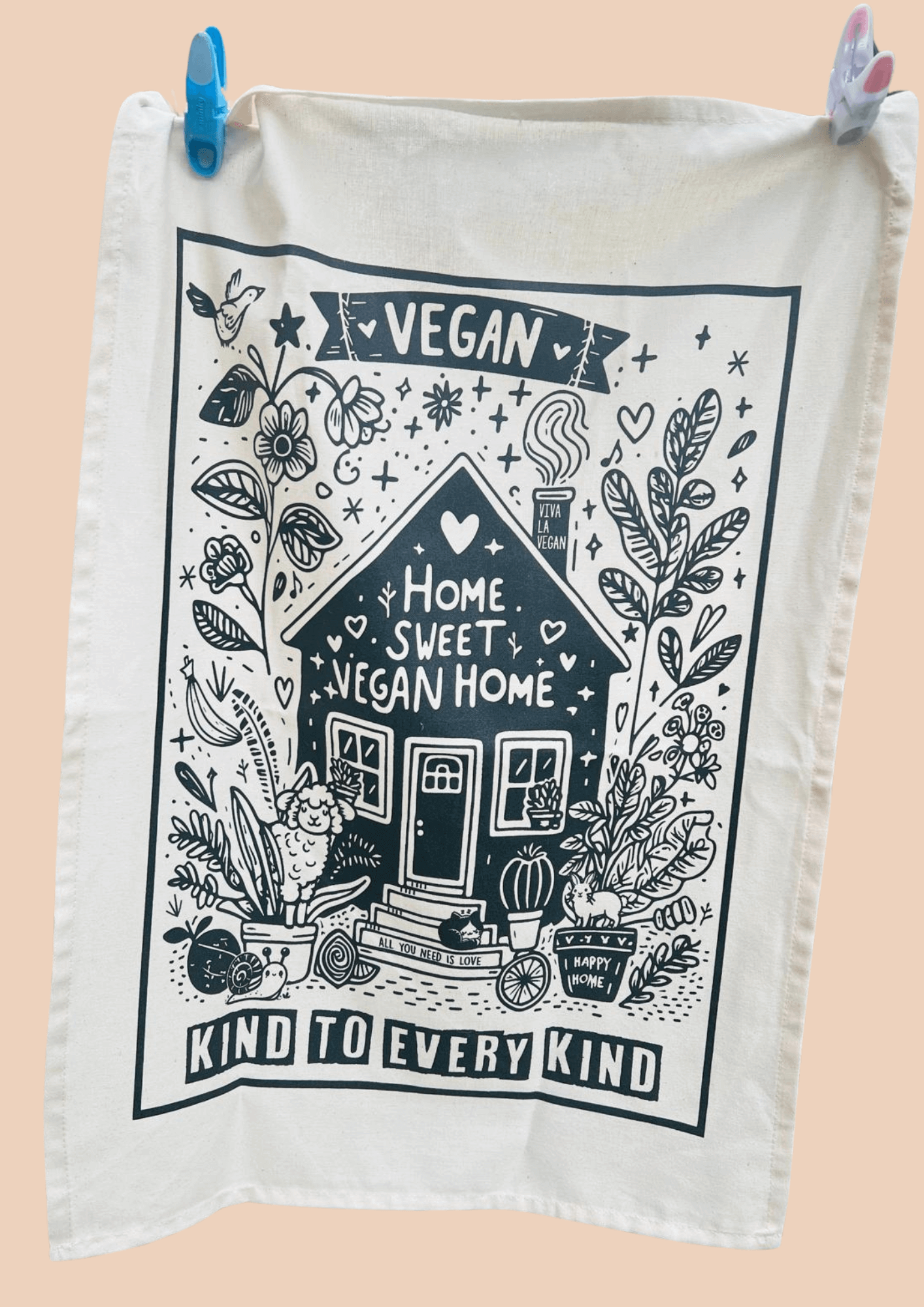 Home Sweet Vegan Home Teatowel hanging up by pegs